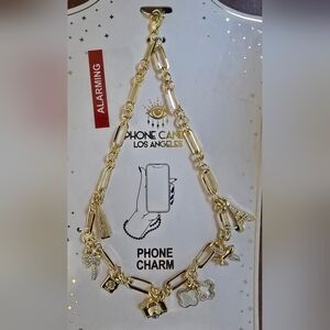EYE CANDY Gold Tone Phone Charm with Eiffel Tower, Plane, Camera, Etc